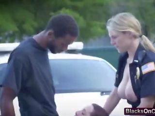 Nasty and busty police whores fucked hard by a black boy they arrested