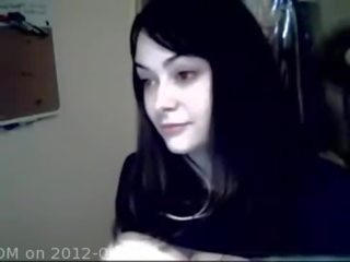 Pretty darling showing her huge boobs on webcam